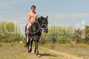 naked man and stallion