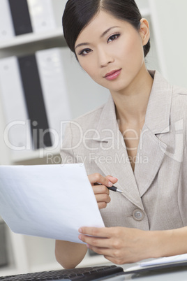 Asian Chinese Woman or Businesswoman in Office