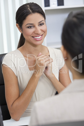 Hispanic Latina Woman or Businesswoman in Office Meeting