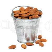 Tin bucket full of almonds
