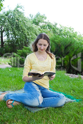 teen girl reading book