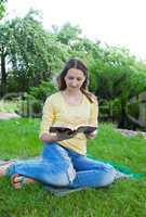 teen girl reading book