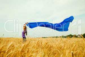 teen girl at a wheat field