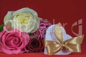 heart shaped gift box with rose