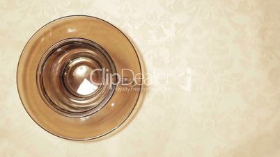 Top View of Coffee Poured in to Cup full of Creamer