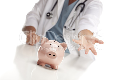Demanding Doctor Reaches Palm Out Behind Piggy Bank