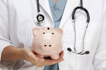 Doctor with Stethoscope Holding Piggy Bank Abstract