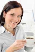 Attractive businesswoman hold cup of coffee