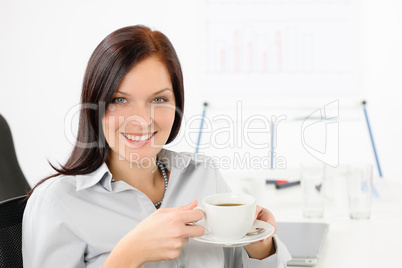 Attractive businesswoman drink coffee