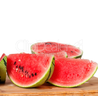 fresh watermelon on a  wood table