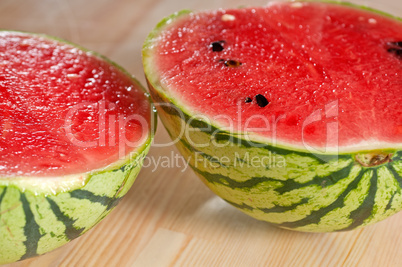 fresh watermelon on a  wood table