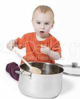 baby with big cooking pot