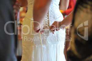 Wedding gown being tied up