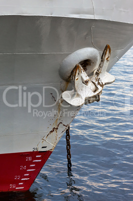 Ship fore with raised anchor.