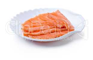 Sliced red fish on plate