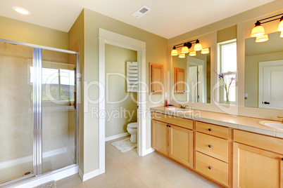 Beautiful classic bathroom with double sink and shower.