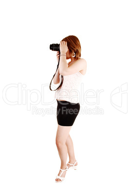Girl taking pictures.