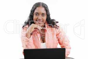 Portrait of a beautiful young black woman working on laptop