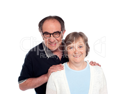 Lovable husband posing along with wife