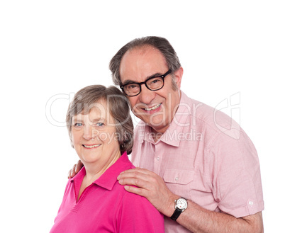 Smiling aged love couple posing