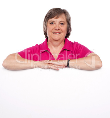 Woman advertising blank banner ad