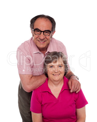 Lovely family posing for a photo shot, in studio