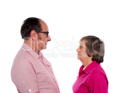 Looking into each others eyes. Aged love couple