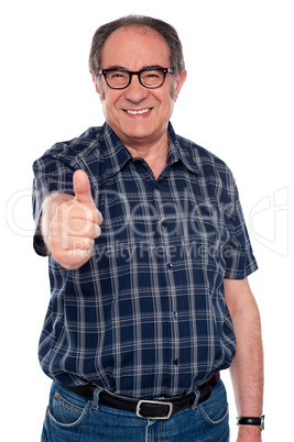 Aged man gesturing thumbs up