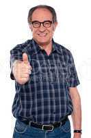 Aged man gesturing thumbs up