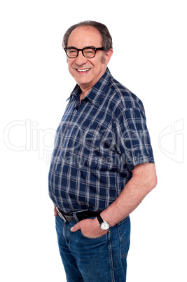 Man standing with hands in jeans pocket