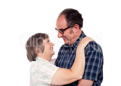 Aged couple in a romantic mood
