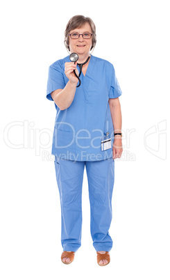 Senior lady doctor posing with stethoscope