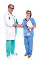 Medical representatives shaking hands