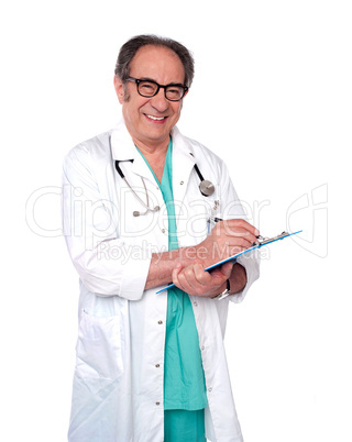 Friendly male doctor with a clipboard