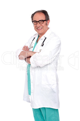 Portrait of smiling senior male surgeon