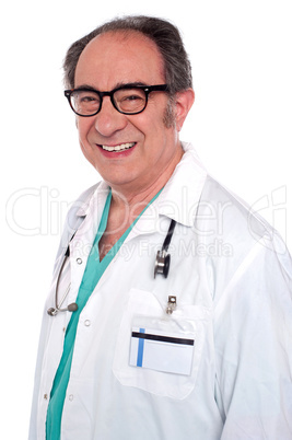 Matured male surgeon with stethoscope