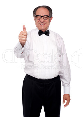 Matured man showing thumbs up