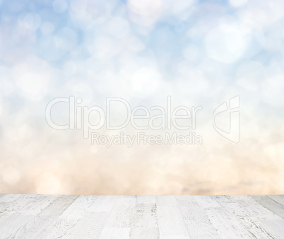 Blue sky behind wooden floor