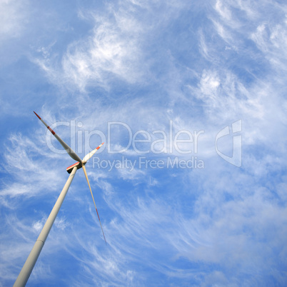 Windmill against blue sky with copy space