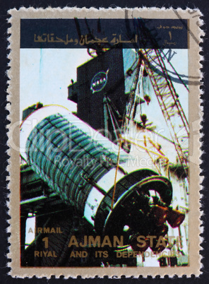 Postage stamp Ajman 1973 Assembly of a Rocket