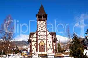 The old wooden Catholic church at ski resort, Tatranska Lomnica,