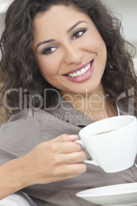 Happy Hispanic Woman Smiling Drinking Tea or Coffee