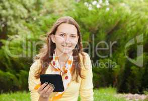teen girl reading electronic facebook