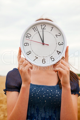 female holds watches