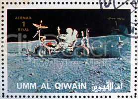 Postage stamp Umm al-Quwain 1972 Astronaut Driving a Moon Rover