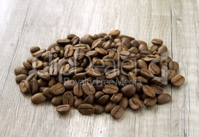 coffee beans on the wooden background