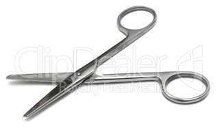 Metal medical shears on a white background