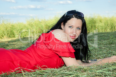 Woman lying on the grass