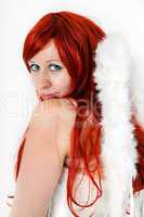 Red-haired woman as an angel