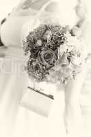 Bride carrying her bouquet